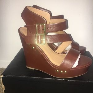 Brown and gold boutique wedge heels.